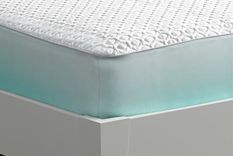white fabric cal king mattress protector