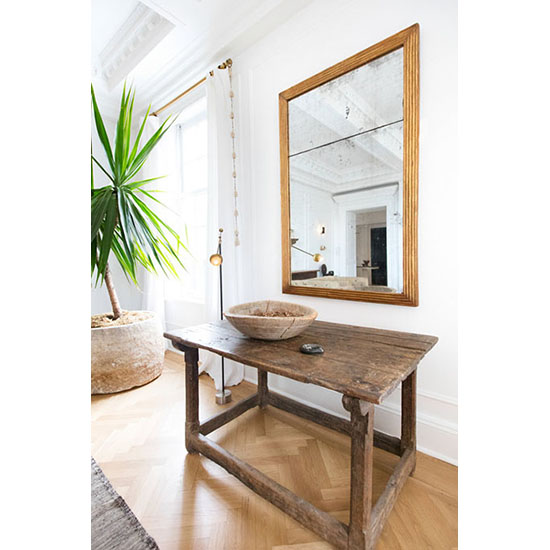 wood table with large mirror room