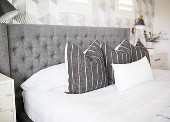 Grey upholstered bed Grey Striped Pillows