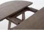 Jaxon Grey Wood Grey 54-72" Round To Oval Extendable Dining Table - Detail