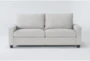 Reid Buff Beige Fabric 80" Sofa - Signature